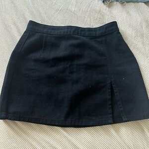 Black mini skirt with side slit